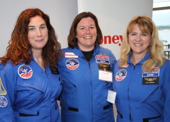 New Honeywell Educators Carolyn Scott (left) and Leslie Almstead (right) pose with Space Academy alumna Pamela Herrington (center, Class of 2013).  All three teach in the East Syracuse Minoa Central School District.