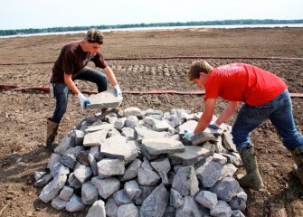 The flat rocks on top of this rock pile will provide turtles and snakes surfaces to bask in the sun and warm themselves.