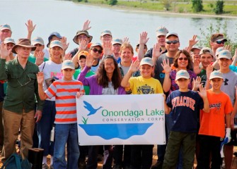 Corps members at the Onondaga Lake Visitors Center share outcomes and pledge “to protect and conserve the natural resources of Onondaga Lake.”