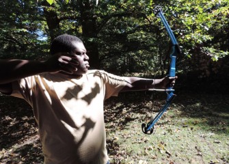 A proper stance is important to successful shooting.  Nizair Evans has just released his arrow.