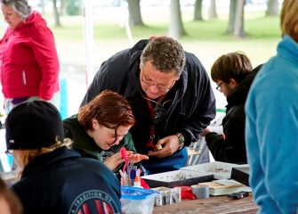 BioBlitz was part of the celebration surrounding the inauguration of SUNY-ESF’s president, Quentin Wheeler, Ph.D. (center), who is helping a student identify an insect.