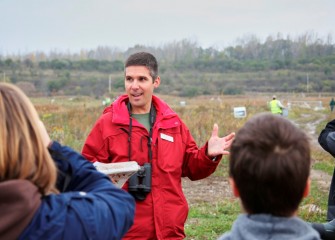 Before embarking on a walk to inventory birds, Montezuma Audubon Center director Chris Lajewski briefs birdwatchers on identifying species.