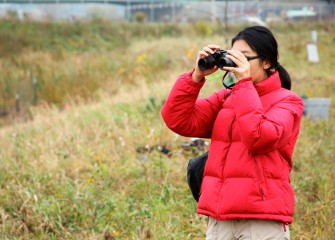 Wendy Huang, SUNY-ESF student, assists with citizen science monitoring near Geddes Brook, which is part of the Onondaga Lake Important Bird Area watershed.