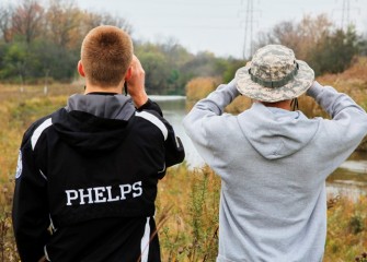 Brad Phelps and R.J. Herrick of Tully track native birds along Geddes Brook.