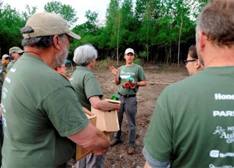 Center Director Chris Lajewski of the Montezuma Audubon Center explains important features of successful nest box installation, such as height off the ground and spacing.