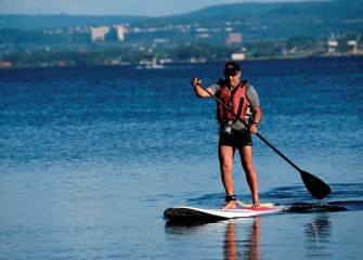 The symbolic swim represented the ongoing return of Onondaga Lake as a community asset.