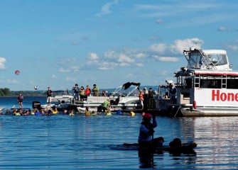 Participants enjoy swimming in a lake with water quality the best in over 100 years.