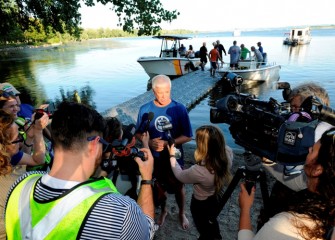 NYSDEC commissioner Martens, speaking to media on the lake shore.