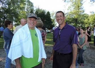 Former Onondaga County Executive Nick Pirro (left), always said he would swim in the lake someday and “today is the day.”  Salina Town Supervisor Mark Nicotra (right) came to cheer him on.