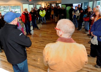 After arriving at the Onondaga Lake Visitors Center, participants are welcomed by Christopher Calkins (left), Vice President at O’Brien & Gere and fellow Onondaga Lake Conservation Corps volunteer.