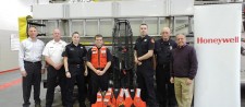 Solvay Fire Department received more than $5,000 worth of water rescue equipment, including personal flotation devices, buoys, lights, and stretchers. Pictured left to right are Honeywell Syracuse Program Director John McAuliffe, Chief of Fire Tom Spaeth, volunteer firefighter Heidi Armstrong, volunteer firefighter Jayson Kellogg, volunteer firefighter and EMT Steve VanOrden, volunteer firefighter Bob Zingaro, and Honeywell’s Advisor for Emergency Preparedness Peter Alberti.