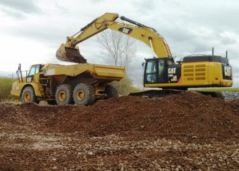 Construction begins to cover, and eventually seal, the sediment consolidation area.