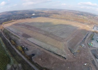 317,710 cubic yards of soil were used to cover the 979 geotubes at the 50-acre consolidation area.  Construction will resume next spring.