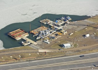 Bubblers in the water keep ice from forming around docks and equipment stored for winter.