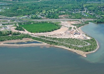 Construction is under way on the county’s Lakeview Amphitheater along the western shoreline of Onondaga Lake. A newly created wetland is visible to the left.