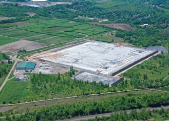 Covering the consolidation area with a leveling layer averaging four feet thick begins (left corner). The Shrub Willow Farm is above left.
