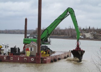 Mechanical capping on Onondaga Lake takes place near the mouth of Nine Mile Creek.