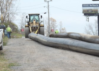 The pipeline used to transport dredged material is disassembled after completion of dredging on November 3.