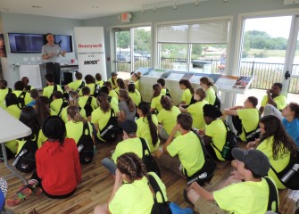 On Friday, Honeywell Day, Summer Science Week students visit the Onondaga Lake Visitors Center, where they are welcomed by Honeywell Syracuse Program Director John McAuliffe.