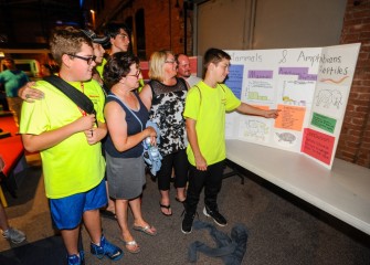 Family members also attend the afternoon poster session, learning more about students’ STEM (science, technology, engineering and math) experiences the previous week.