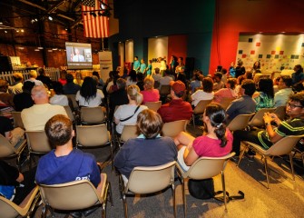 Congressman John Katko speaks to students and families by video message, commending the students’ interest and engagement in STEM learning.