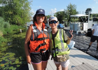 Diane Mantooth (left), a first-time Corps volunteer from Clay, and Lisa Wang, a returning volunteer from Fayetteville, enjoyed working together on a stewardship project that helps our local waterways.