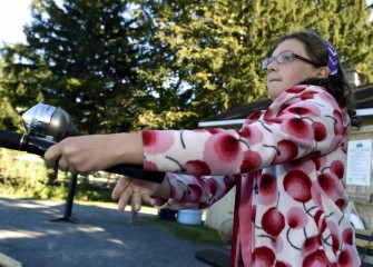 Maggie Lootens, age 10, learns how to fish in the Time Out to Fish Pond at Carpenter’s Brook Fish Hatchery. The Friends of Carpenter’s Brook constructed the three-quarter acre pond, which supports fishing programs for children and adults.