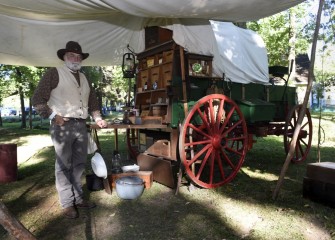 A new area at Sportsmen’s Days this year included various living history displays. Doug Corey, from Phoenix, New York, stands with his authentic restored chuck wagon.