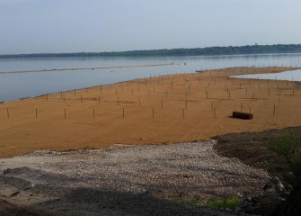 Seeding and installation of erosion control mat is completed on the eastern point by Nine Mile Creek.