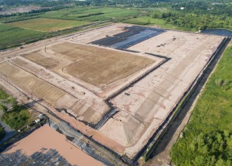 All facets of the cover construction continue, including liner placement, welding liner seams, building soil layers and the storm water drainage system.