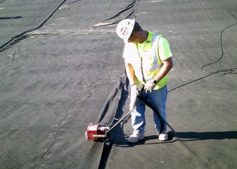 Sections of the polyethylene liner are welded together using heat.