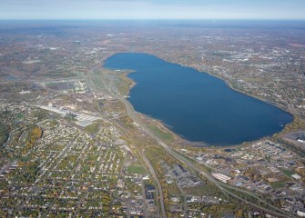 The dredging of Onondaga Lake was completed in 2014, a year ahead of schedule. Shoreline plantings and habitat restoration will continue in 2017.