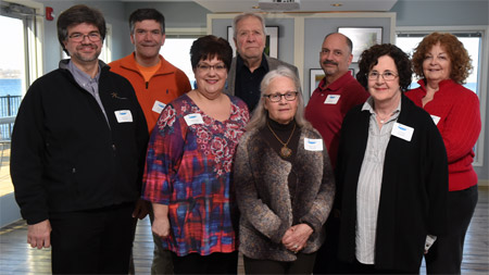 This year’s exhibit featured 11 local photographers, more than any other year. The photographers pictured left to right (front row): John DeNicola, Michele Neligan, Cheryl Lloyd, Carol Keeler, (back row): Warren Wheeler, Tom Lloyd, Phillip Bonn and Diana Whiting. Not pictured: Greg Craybas, Jonathan Kresge and John Savage.