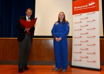 New York State Senator David J. Valesky surprises 2015 HESA teacher Sara Pieklik at Liverpool Middle School with a proclamation in recognition of her acceptance to Honeywell Educators @ Space Academy.