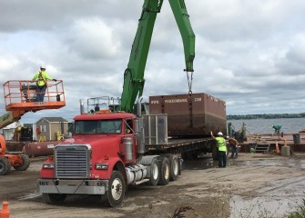 Barges are disassembled as work wraps up in various sections of the lake. Capping continues in the southwest area of the lake.