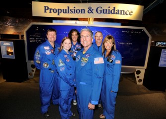 At the Milton J. Rubenstein Museum of Science & Technology (MOST) with former astronaut Donald Thomas (center) are Honeywell Educators (left to right) Robert Woolery, Sara Pieklik, Becky Loy, Brian Ramsden, and Kathy Conese. Thomas was in Syracuse for the 10th annual Honeywell Summer Science Week.