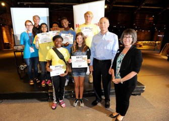 During the closing ceremony, students receive certificates for completion of Honeywell Summer Science Week.