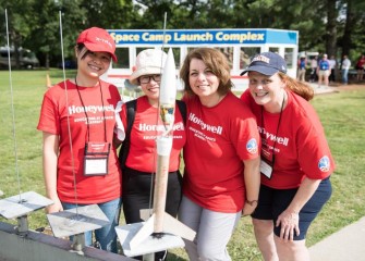 Sally Mitchell (right) with fellow team members at the Space Camp Launch Complex at USSRC in Huntsville, Alabama.