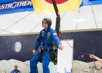 Gillette Road Middle School teacher Stephen Bacon in a gravity chair at HESA 2016.