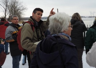 Montezuma Audubon Center Director Chris Lajewski (center left) also assists identifying birds. Several Bald Eagles are spotted along the Onondaga Lake shoreline.