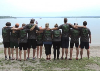 A team prepares to head out onto the lake to compete.