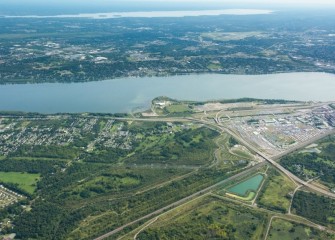 A green corridor is emerging, connecting Onondaga Lake to restored tributaries and beyond.  Oneida Lake can be seen to the northeast (background).