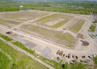 Equipment is mobilized to resume construction at the consolidation area.