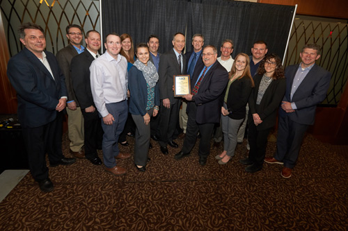 Onondaga Lake cleanup team representatives accept the 2018 Outstanding Civil Engineering Achievement Award from the Syracuse section of the American Society of Civil Engineers.