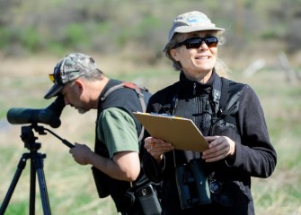 Ruth Florey (right), Onondaga Audubon Society member and Corps volunteer, tracks bird species with local wildlife photographer and Corps member Phillip Bonn.