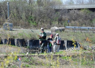 Volunteers with the Onondaga Lake Conservation Corps and the Young Naturalists Leadership Team (YNLT) of Izaak Walton League fan out to inventory plant and animal species.