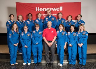 Syracuse City School District teacher Erin Emanuele (top left) with her mission team at HESA, “Team Zvezda,” and astronaut speaker Lawrence (Larry) DeLucas, Ph.D. (center).  DeLucas was born in Syracuse, NY.