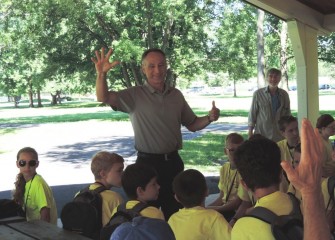 Honeywell Syracuse Program Director John McAuliffe interacts with students during a kickoff event on the opening day of Honeywell Summer Science Week at the Museum of Science and Technology (MOST).