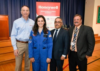 From left to right are:  John McAuliffe, Honeywell Syracuse Program Director; Erin Emanuele, Math Teacher; Jaime Alicea, Syracuse City School District Superintendent; and John Devendorf, Principal at J. T. Roberts PreK-8 School.