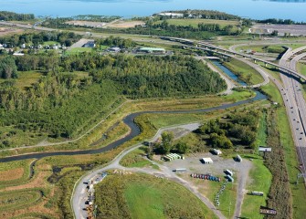 The restoration of Nine Mile Creek, completed in 2014, included a new creek bottom, improved shoreline habitat, and wetlands.